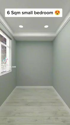 an empty room with white walls and wooden floors, the floor is painted light green