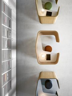 three shelves that have different shapes and sizes