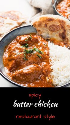 a plate full of food with rice and sauce on it, next to some bread