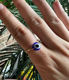 gold plated ring glass bead handmade simple and elegant long lasting and great quality! When a person wears or carries an evil eye with them, it guards against misfortune happening in one's life. Evil Eye Open Ring As Gift, Spiritual Evil Eye Rings As Gift, Adjustable Evil Eye Open Ring Jewelry, Spiritual Blue Rings With Evil Eye Detail, Spiritual Blue Ring With Evil Eye Detail, Blue Spiritual Ring With Evil Eye, Spiritual Evil Eye Ring Jewelry, Spiritual Blue Evil Eye Ring, Evil Eye Ring