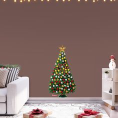 a living room with a christmas tree on the wall and presents in front of it