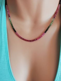 black tourmaline necklace gold october birthstone green tourmaline choker necklace for women tourmaline jewelry october birthday pink tourma This necklace is a gorgeous tourmaline strand! The tourmaline gemstones are faceted which means that they reflect the light and thus they give a dainty sparkling touch to the necklace and your look! The torumalines are black, green, pink, and some yellowish! Beautiful colors that form an elegant rainbow! This necklace is a statement necklace so you don't ne Adjustable Tourmaline Gemstone Beads Jewelry, Elegant Adjustable Tourmaline Necklace, Adjustable Tourmaline Gemstone Necklace, Dainty Tourmaline Gemstone Beads Jewelry, Gemstone Beads Jewelry For May Birthstone, Dainty Tourmaline Gemstone Jewelry, Round Tourmaline Necklace For Gifts, Round Tourmaline Necklace Gift, Dainty Tourmaline Necklace For Gift