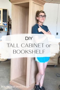 a woman standing next to a tall cabinet with the words diy tall cabinet or bookshelf