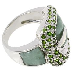 Jade of Yesteryear Jade and Gemstone Sterling Silver Buckle Ring This statement ring takes the classic buckle design and gives it a vibrant, gem-forward twist that will have heads turning.       Approx. 13/16"L x 7/8"W x 5/16"H; shank 1/8"W     Stamped .925 sterling silver; rhodium plating   Stone Information       All sizes and weights approximate     Green Jade - Geometric (15x10mm, 8x7mm)     Chrome Diopside - Round; 0.90ctw     Color-Enhanced Polymer Impregnated Purple Jade - Geometric (15x1 Lavender Jade, Buckle Ring, Purple Jade, Tanzanite Stone, Color Bands, Jade Jewelry, Green Jade, Jade Green, Statement Ring