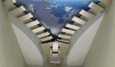 an artistic view of the earth from inside a room with stairs leading up to it