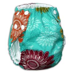 a cloth diaper cover with flowers on it