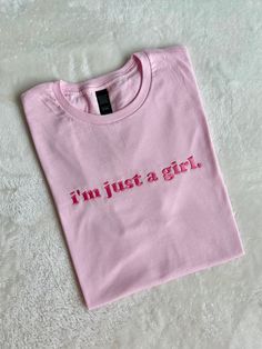 "I'm just a girl!" This super fun and adorable shirt is Handmade with embroidered stitching. Material: 50/50 Cotton, Poly Blend T-shirts are Jersey Knit Soft Fabric Fit: Unisex Ladies should order 1 size down from their normal size for a more snug fit. Care: Machine wash with like colors. Tumble dry like normal. Please be sure to select T-SHIRT or SWEATSHIRT as you will receive the selection you made in the dropdown. Want another color shirt or sweatshirt? Message us before purchasing Cheap Pink Embroidered T-shirt, Self Love Shirt Design, Cute Long Sleeve T-shirt With Embroidered Text, Pink Crew Neck T-shirt With Embroidered Graphics, Cute Crew Neck Top With Embroidered Text, Cute Embroidered Cotton Shirt, Pink Cotton T-shirt With Embroidered Graphics, Pink Cotton Crew Neck Shirt, Pink Embroidered T-shirt