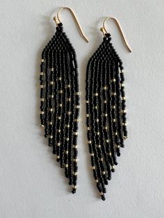 Elegant Adjustable Beaded Earrings With Beaded Chain, Elegant Adjustable Beaded Earrings, Elegant Black Earrings With Tiny Beads, Elegant Black Beaded Earrings With Tiny Beads, Elegant Long Drop Earrings With Tiny Beads, Elegant Black Beaded Dangle Earrings, Black Beaded Dangle Earrings With Beaded Chain, Handmade Black Beaded Long Drop Earrings, Black Faceted Bead Drop Earrings