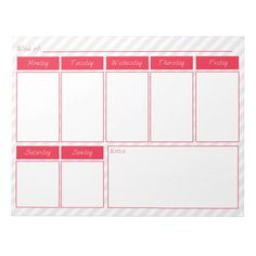 a pink and white weekly planner with red lettering on the side, in front of a striped