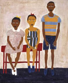 three people sitting on a bench in front of a wall with a painting behind them