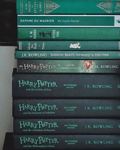 a stack of harry potter books sitting on top of each other