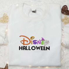 Disney Halloween Embroidered Sweatshirt, Disney Cartoon Embroidered Hoodie, Best Halloween Gift Ideas Tinicloset stands as a vibrant sanctuary in the realm of fashion, a beacon that marries bespoke creativity with personalized style, offering a treasure trove of custom embroidered garments that transcend mere attire and weave tales of individuality. Within our curated anthology resides an... Halloween Gift Ideas, Halloween Charms, Embroidered Sweatshirt, Embroidered Hoodie, Disney Halloween, Embroidered Sweatshirts, Disney Cartoons, Halloween Gift, Great Love