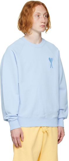 French terry sweatshirt. · Rib knit crewneck, cuffs, and hem · Logo embroidered at front and back Supplier color: Sky blue Blue Crew Neck Sweater With Logo Detail, Blue Long Sleeve Sweatshirt With Logo, Blue Crew Neck Sweats For Spring, Blue Long Sleeve Sweatshirt With Embroidered Logo, Blue Crew Neck Sweatshirt With Embroidered Logo, Blue Sporty Sweater With Embroidered Logo, Blue Ribbed Collar Sweatshirt For Spring, Blue Cotton Sweater With Embroidered Logo, Paris Blue