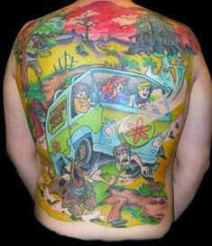 the back of a man's body with cartoon tattoos on his upper and lower half