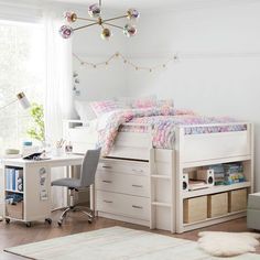 a bedroom with a bed, desk and chair next to a white rug on the floor