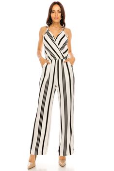 Our chic striped romper pants will have heads turning! Dress it up in your favorite heels or keep it casual in flip flops. Striped Slit pockets Unlined Adjustable straps Model is 5’9” with a 32" bust, 24” waist, and 37” hips. Wearing size small Junior Size Chart Small- 0/4 Medium- 5/6 Large- 7/8 Extra Large- 9/10 Pinstripe Jumpsuit, Plus Size Belts, Culotte Jumpsuit, Cropped Jumpsuit, Guess By Marciano, Romper Outfit, Striped Rompers, Dress Sewing Patterns, Guess Jeans