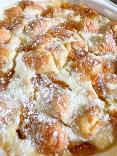 a pastry dish with powdered sugar on top