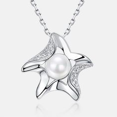 Description & Details Embrace the beauty of the sea with our meticulously crafted pieces that capture the essence of starfishes in stunning detail. From elegant starfish pendants to intricate starfish necklaces, our collection offers a range of styles to suit your unique taste. • Material: Solid 925 Sterling Silver ∙ Pearl ∙ Cubic Zirconia • Finish: Hypoallergenic ∙ Gold Plating•Dimensions: 40 - 45 cm chain , adjustable• All our work is custom made by hand with love Elegant Starfish Charm Star Necklace, Elegant Starfish Charm Necklace, Elegant Star-shaped Necklace With Starfish Charm, Elegant Starfish Necklace For Gift, Elegant Starfish Charm Pendant Jewelry, Elegant Starfish Charm Jewelry For Gifts, Elegant Starfish Charm Jewelry Gift, Elegant Starfish Charm Jewelry As Gift, Elegant Pendant With Starfish Charm