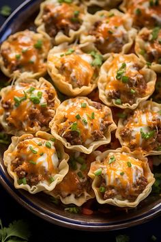 a plate filled with meat and cheese cups