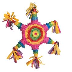 a multicolored star decoration hanging from the ceiling with tassels on it