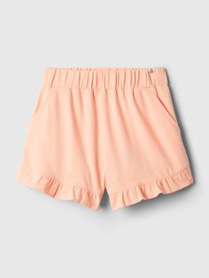 Soft knit pull-on shorts with light stretch.  Elasticized waist.  Front slant pockets.  Ruffle hem.  Certain styles have an allover print.  Easy pull-on waist.  Easy through the hip and thigh.  Sizes range from baby to toddler. Shorts With Built-in Shorts For Playwear, Casual Pink Cotton Bloomers, Casual Pink Short Bloomers, Playful Elastic Waistband Shorts For Loungewear, Playful Spring Shorts With Elastic Waistband, Playful Shorts With Elastic Waistband For Spring, Playful Loungewear Shorts With Elastic Waistband, Playful Spring Pajama Shorts, Cute Shorts With Elastic Waistband For Playwear