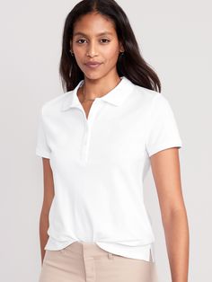 Rib-knit collar; short-sleeves.  Four-button placket.  Drop-tail hem, with vented sides.  Soft pique cotton, with comfortable stretch.  Fitted through body.  Women's polo hits below waist.  models are approx.  5'9" and wear sizes s (4), l (12), and xl (18)machine wash according to the care instruction label Classic Stretch Polo Shirt In Solid Color, Stretch Short Sleeve Polo Shirt, Classic Stretch Polo Shirt, Short Sleeve Polo Shirt For Work, Short Sleeve Polo Shirt With Placket For Work, Short Sleeve Polo Shirt With Seamless Collar, Fitted Polo Shirt With Short Sleeves, Stretch Cotton Collared Polo Shirt, Classic Stretch Collared Polo Shirt