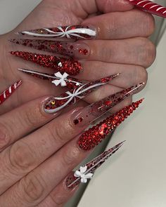 Anyone else excited for Christmas? ❄️🎀💕 November-December appointments available now! Don’t miss out on your seasonal nail sets🎄 #explorepage #explorepages #explorepageready #explorepage✨ #christmas #christmasnails #christmasnailsart #losangelesnails #losangeles #losangelesnailtech #nailsonfleek #nails #nailsofinstagram Christmas Nails Blinged Out, Bling Nails Christmas, Dramatic Christmas Nails, Sharp Christmas Nails, Red Bling Christmas Nails, Grinch Stilleto Nails, Christmas Stellio Nails, Red Stiletto Christmas Nails, Stilleto Christmas Nail