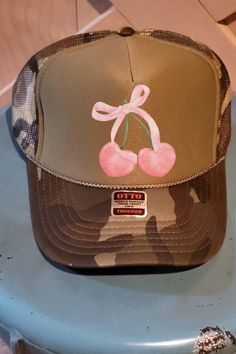 Women's Trucker Hats with DTF transfer on an Otto brand hat...cherries and bow by RollinViolation on Etsy Trendy Adjustable Trucker Hat For Outdoor, Casual Mini Hat With Short Brim For Gifts, Casual Mini Hat With Short Brim As Gift, Trendy Trucker Hat With Short Brim For Outdoor, Trendy Short Brim Trucker Hat For Outdoor, Casual Mini Hats For Gifts, Cute Adjustable Trucker Hat With Short Brim, Casual Green Trucker Hat For Gift, Casual Green Trucker Hat Gift