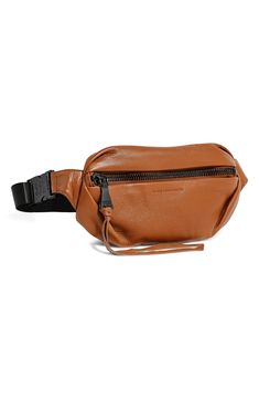 Toss this belt bag on before you leave the house so you can keep you hands free and your essentials secure while you're out and about. Front zip closure Adjustable belt with squeeze buckle Back slip pocket with magnetic closure Interior zip pocket Leather Imported Functional Leather Belt Bag For On-the-go, Modern Brown Bag With Removable Belt, Versatile Leather Bag With Removable Belt, Modern Leather Belt Bag With Belt Loops, Functional Belt Bag With Removable Belt For Everyday Use, Versatile Brown Bag With Removable Belt, Versatile Brown Leather Belt Bag, Versatile Brown Belt Bag For On-the-go, Leather Belt Bag With Removable Belt For On-the-go