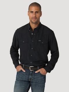 WESTERN RELIABILITY Take on the unexpected in one of our most dependable shirts. The Wrangler® performance long-sleeve solid snap shirt comes with everything you need to take on the day, including UV protection from the sun’s harmful rays and a moisture-wicking finish to keep you feeling dry. This classic fit shirt is crafted for unparalleled performance and comfort, complete with a back vent for breathability. It also features that classic western styling you know and love, including pointed yo Western Long Sleeve Tops For Outdoor, Western Style Long Sleeve Tops For Outdoor, Workwear Jeans, Wrangler Shirts, Mens Workwear, Outdoor Pants, Utility Pants, Outdoor Men, Work Wear Women