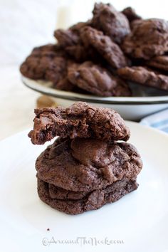 three chocolate cookies stacked on top of each other