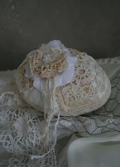 an old lace bag with a flower on it