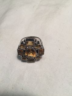 Unusual cut of citrine gemstones Sterling Filigree white gold finished Setting Handmade Size 6 Can be resized All rings are shipped in a nice gift box. Check out our over a THOUSAND great reviews Engraving is $4 per letter and is not always perfect depending on the piece. It can take a few days if the jeweler is busy. This is payable to Paypal Judithsltd@gmail.com Luxury Citrine Gemstones For Gifts, Silver Faceted Crystal Ring For Formal Occasions, Formal Silver Citrine Crystal Ring, Formal Silver Faceted Crystal Ring, Modern Silver Topaz Ring With Gemstone Accents, Silver Citrine Jewelry With Accent Stones, Luxury Silver Topaz Ring With Citrine, Faceted Citrine Silver Jewelry, Silver Faceted Citrine Jewelry