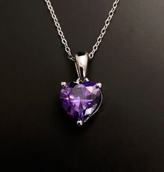 Solid Sterling Silver Amethyst February birthstone heart pendant. Great February birthday gift, valentines gift or 6th wedding Anniversary gift. Matching earrings available here: https://www.etsy.com/listing/1352794165/ Available to order in gold, white gold, rose gold or platinum, please contact me for prices. 💎Pendant thickness: 6mm 💎Pendant width: 9mm 💎Pendant overall Length: 17mm 💎Chain length: 18 inch or other length if required. ✨ For free giveaways, special offers and latest design up Purple Heart Necklace, February Birthstone Necklace, 6th Wedding Anniversary, 6th Anniversary Gifts, Free Giveaways, February Birthday Gifts, February Birthday, 6th Anniversary, Heart Gemstone