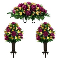 three vases filled with flowers and greenery on top of each other in front of a white background