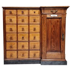 an old wooden cabinet with many drawers