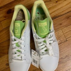 Adidas Stan Smith Prime Green Sneakers Size 8 Men's Nwt White & Lime Green Design Woman's Size 9 Adidas Green Sneakers With Breathable Toe, Adidas Green Sneakers With Perforated Toe Box, Casual Round Toe Tennis Sneakers, Comfortable Adidas Sneakers With White Sole, Casual Tennis Sneakers With Boost Midsole, Spring Tennis Low-top Sneakers, Green Synthetic Tennis Sneakers, Comfortable Adidas Slip-on Sneakers, White Tennis Sneakers For Spring