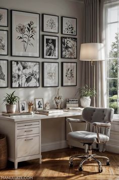 a home office with lots of pictures on the wall