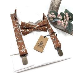 Bronze Rust Suspenders, Bronze Bow tie, Suspender Bowtie, Wedding Floral Suspenders, Groomsmen Suspenders, Ring bearer outfit Suspender size : ■ BABY SET (6 - 18 mo): ■ BOW TIE - 3.3" inches (8.5 cm )  Pre-tied and made with adjustable white strap and white plastic clasp. ■ SUSPENDERS - adjustable from 16" to 27". Made of elastic. / Y-shape back. ■ Y-back suspenders of high quality elastic. Adjustable Clip and Elastic straps for you to adjust the length. » Small (6mp - 5 years old size) SET come Ring Bearer Outfit Suspenders, Floral Suspenders, Suspenders Ring Bearer, Suspenders Groomsmen, Bowtie Wedding, Groomsmen Suspenders, Bearer Outfit, Ring Bearer Outfit, Wedding 2025