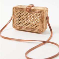 Cute Structured Bag With Woven Details Faux Leather 4” Handle Drop Casual Rectangular Clutch With Adjustable Strap, Chic Rectangular Box Bag For Vacation, Chic Rectangular Straw Bag With Detachable Strap, Casual Rectangular Clutch With Removable Pouch, Chic Box Bag With Adjustable Strap For Vacation, Chic Natural Color Rectangular Box Bag, Chic Natural Rectangular Box Bag, Chic Rectangular Natural Box Bag, Spring Rectangular Box Bag With Removable Pouch