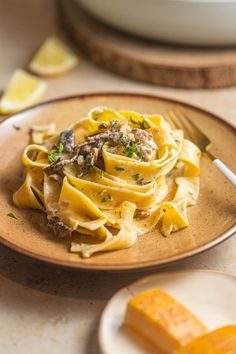 a plate with some pasta and cheese on it