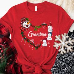 Snowman Heart Christmas Grandma And Kids CTH01 T-ShirtGreat as Birthday gifts or Holiday presents. This adorable item can be designed upon anyone's wish with any title.Please enter:1. Nickname. ie. Grandma, Nana, Mimi, ...etc.2. Kids' Names wanted on the shirt (Names separated by commas)All items are made to order.* Please be aware that the physical product's colors may differ slightly from the mockup. Brand: Gildan Classic unisex cut makes this easy to fit the body. Material: Heavyweight fabric T Shirts For Couples, Shirt Names, Pink Girl Birthday, Shirts For Couples, Dog T Shirts, Sublimation Shirts, Snowman Family, Customized Shirts, Custom Made Dress