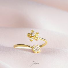 With this dainty Original 925 Silver Shining Korean Style Minimalist Flower Ring look as beautiful outside as you are within. this elegantly crafted 925 Sterling Silver Floral Ring is perfect for everyday wear. This Dainty Two Flower Stackable Ring is crafted with love and care for elegant moments of yours. Invest in your beauty, invest in Jewelry. These Handmade Adjustable Band rings are perfect for everyday wear and a perfect gift for birthdays, Christmas, or best friends. PRODUCT DETAILS The Adjustable Delicate Flower Promise Ring, Dainty Flower Ring For Anniversary, Adjustable Open Flower Ring Fine Jewelry, Delicate Adjustable Open Flower Ring, Delicate Toe Flower Ring, Dainty Flower Shaped Ring For Promises, Delicate Flower Ring For Promise, Dainty Flower Shaped Promise Ring, Dainty Toe Rings For Anniversary