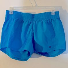 Bright Blue Champion Running Shorts Never Worn Size L Blue Sports Bottoms For Beach Season, Sporty Blue Bottoms For Beach Season, Blue Sporty Shorts For Beach Season, Blue Sporty Shorts For Summer, Sporty Blue Shorts For Beach Season, Champion Shorts, Shorts Athletic, Running Shorts, Athletic Shorts