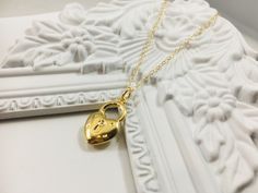 "Very delicate heart shape lock necklace. heart shape lock is vermeil, 18k gold plated over 925 sterling silver . measures about 20x12mm. the chain is 14k gold filled flat cable chain and available in 16\" long 18\" long 20\" long. Each necklace will come in a nice gift box ready to gift. For the larger quantity convo us. Thanks for stopping by!" Heart-shaped Gold Jewelry With Lock, Gold Jewelry With Heart-shaped Lock, Gold Necklaces With Lock For Anniversary, Heart-shaped Lock Necklace Gift, Heart Lock Necklace, Necklace Lock, Heart Shape Necklace, Heart Necklace Gold, Hammered Bangles