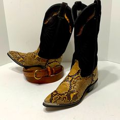 Snakeskin Boots Vintage Cowboy Western Code West In Women’s Size 6. Pointed Toe. Genuine Leather And Snakeskin Pattern With Steel Toe Caps. Quality Made. Has Dark Gray Embroidered Starburst Or Wing Pattern On Black Suede. Very Good Shape For Their Age. 1.5 Inch Heel. Being Vintage These Are Not As Wide As Boots Made Now. True To Size. Very Rock N Roll. Super Sweet Boots 13 Inch Total Height. Western Leather Boots With Snake Print, Western Boots With Snake Print And Round Toe, Yellow Western Leather Boots, Yellow Leather Boots With Snip Toe, Fitted Leather Boots With Snake Print, Fitted Leather Snake Print Boots, Cowboy Code, Wing Pattern, Snakeskin Boots