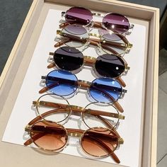 SPECIFICATIONSDepartment Name: ADULTUsage scope: Shopping,travel,beach,party,CyclingFunction: 100% UV 400 Protection against harmfulSupport: Dropshipping,WholesaleBrand Name: OLOIUItem Type: EYEWEARModel Number: 6101Eyewear Type: SunglassesStyle: ovalFrame Material: WoodenPlace Of Origin: China (mainland)Lenses Material: RESINLenses Optical Attribute: polarizedLenses Optical Attribute: GradientLenses Optical Attribute: UV400Lens Width: 53mmLens Height: 39mmOrigin: Mainland ChinaGender: WOMENCertification: CEChoice: yessemi_Choice: yes Mens Glasses Fashion, Sunglasses Women Vintage, Sunglasses Women Fashion, Wooden Sunglasses, Trendy Sunglasses, Designer Glasses, Mens Eyewear, Eyewear Womens, Eyewear Accessories