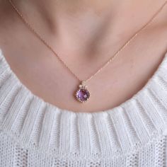 Amethyst Necklace, Genuine Amethyst Necklace in 14K Gold, Unique Diamond Pendant, Gift For Her Natural Diamond : 0.05 CT. F / SI (5 piece) Natural Amethyst : 1.76 CT. (1 piece) Gram 3.49 (It may differ depending on the chain size) Product Code: MR0012057 Adjustable Chain is Optional Length of Chain 16 inches - 24 inches ABOUT US All our products are handmade . Our jewelry is made with real solid gold and natural diamonds and gemstones . Our store was founded in 1992 . Grand Bazaar / Istanbul (Wo Elegant Purple Pendant Birthstone Necklace, Purple Necklace With Prong Setting As A Gift, Purple Necklace With Prong Setting, Gift, Purple Necklace With Prong Setting For Anniversary, Elegant Purple Necklace With Prong Setting, Purple Prong Set Necklace For Anniversary, Purple Prong Setting Formal Necklaces, Fine Jewelry Purple Round Pendant Necklace, Purple Round Pendant Necklace In Fine Jewelry Style