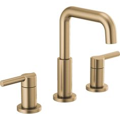 two faucets in brushed brass finish