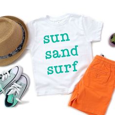 Looking for a cute tee for your kids? We have the perfect Sun Sand Surf graphic tee addition to their closet! Also available in youth tees. Surf Graphic, School Uniform Kids, Trending Graphic Tees, Sand Surfing, Kids Clothes Boys, Top Graphic Tees, Kids Outfits Girls, Toddler Tees, Kids Shorts